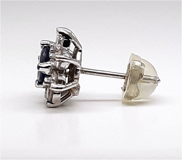A lady’s estate 14k white gold natural blue sapphire and diamond earrings.