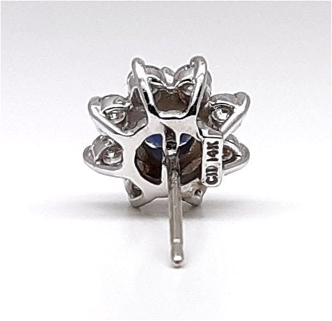 A lady’s estate 14k white gold natural blue sapphire and diamond earrings.