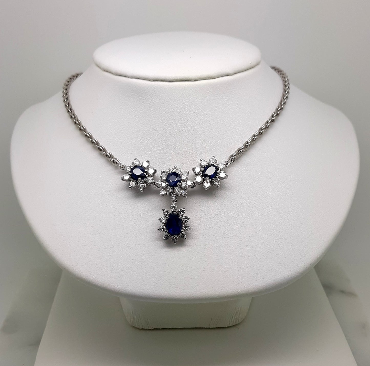 A Lady’s fine estate 14k white gold sapphire and diamond necklace. Circa 1990s