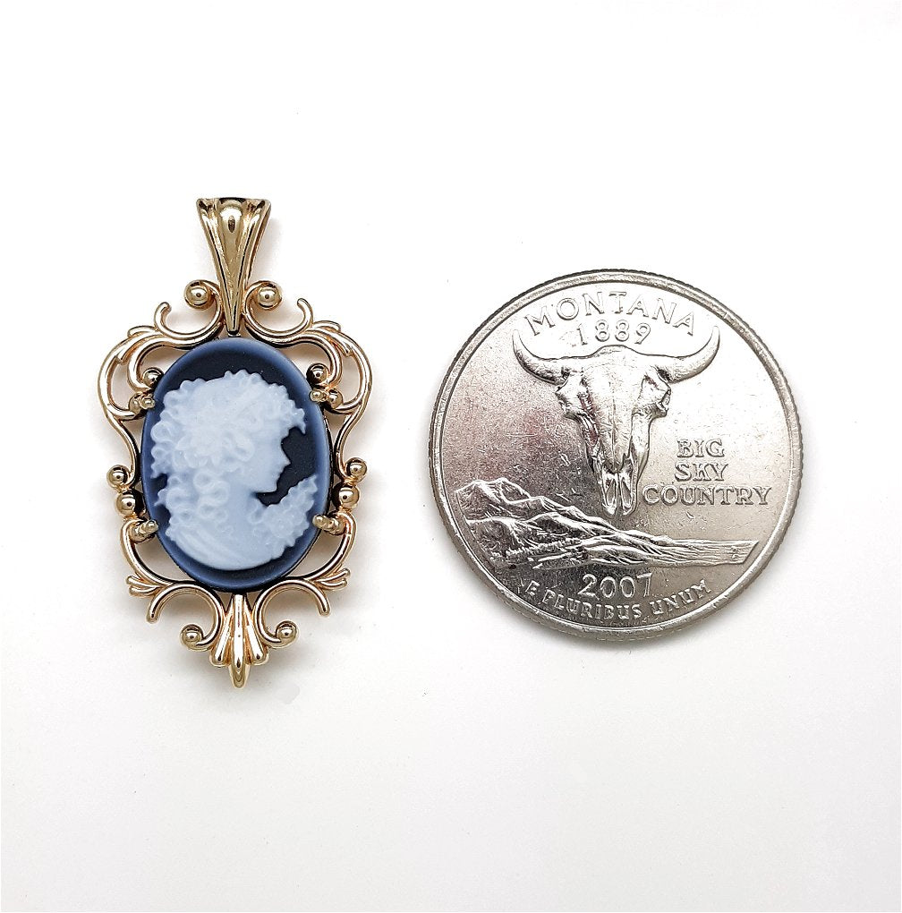 A lady's estate 10k tricolor gold black onyx cameo reversible pendant no chain