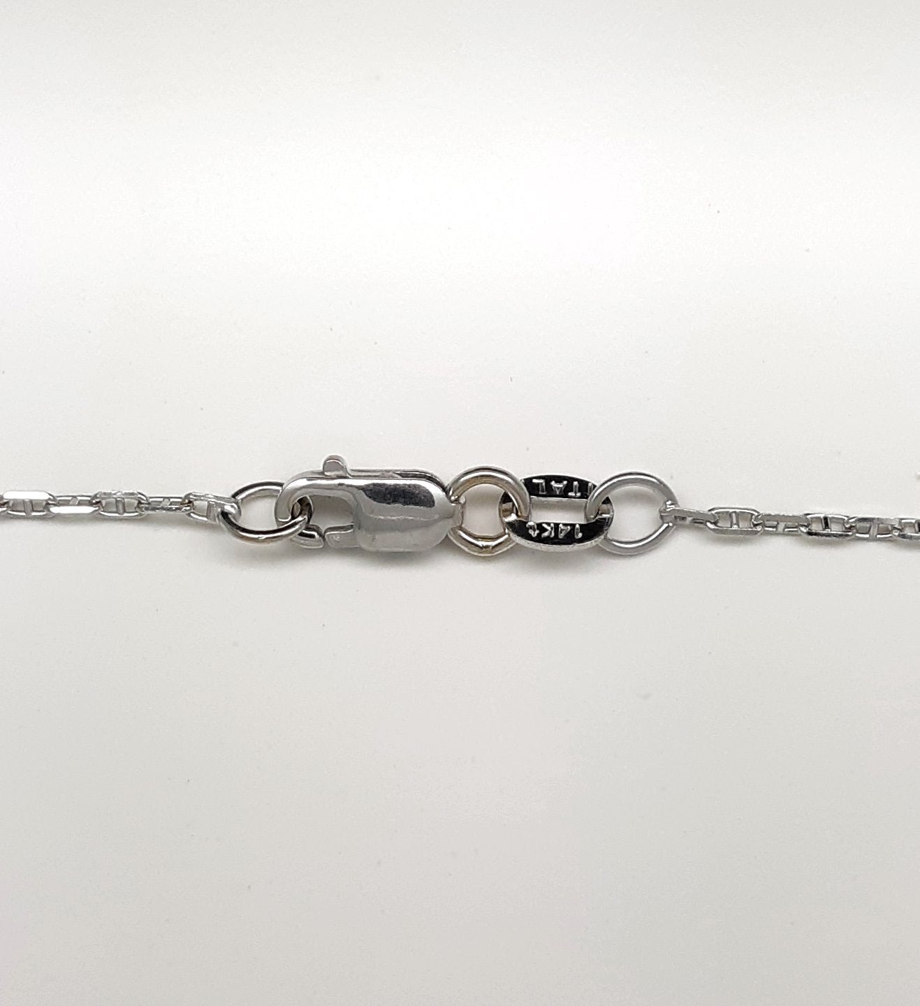 A lady's estate 14k white gold Papal or Roman diamond cross pendant on chain.