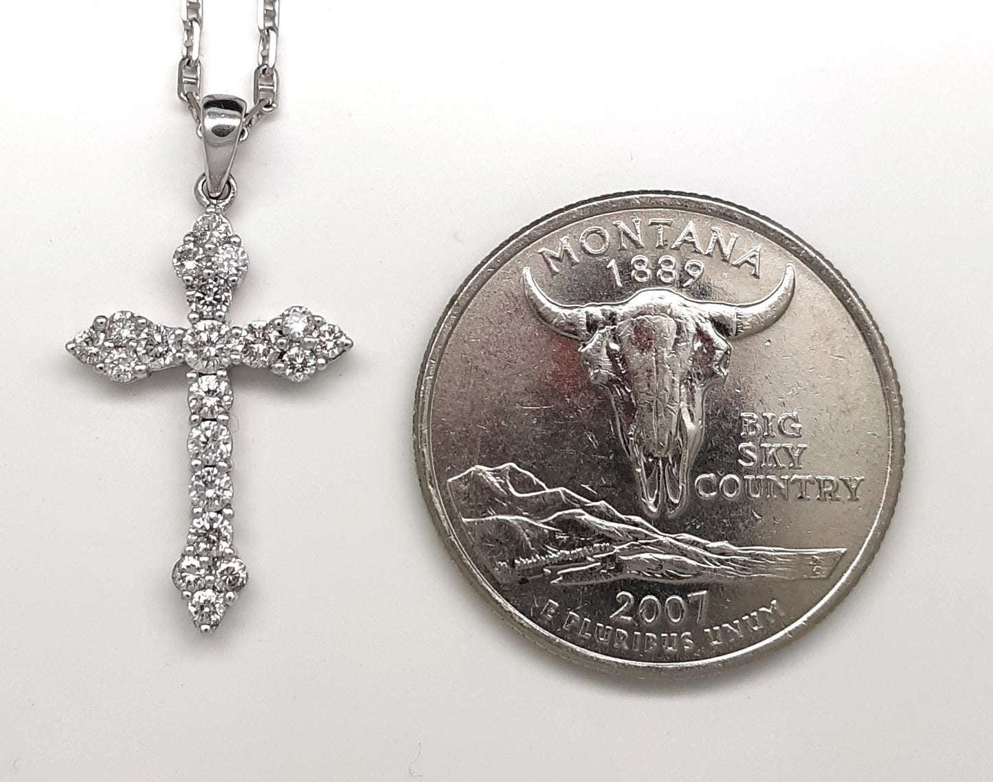 A lady's estate 14k white gold Papal or Roman diamond cross pendant on chain.