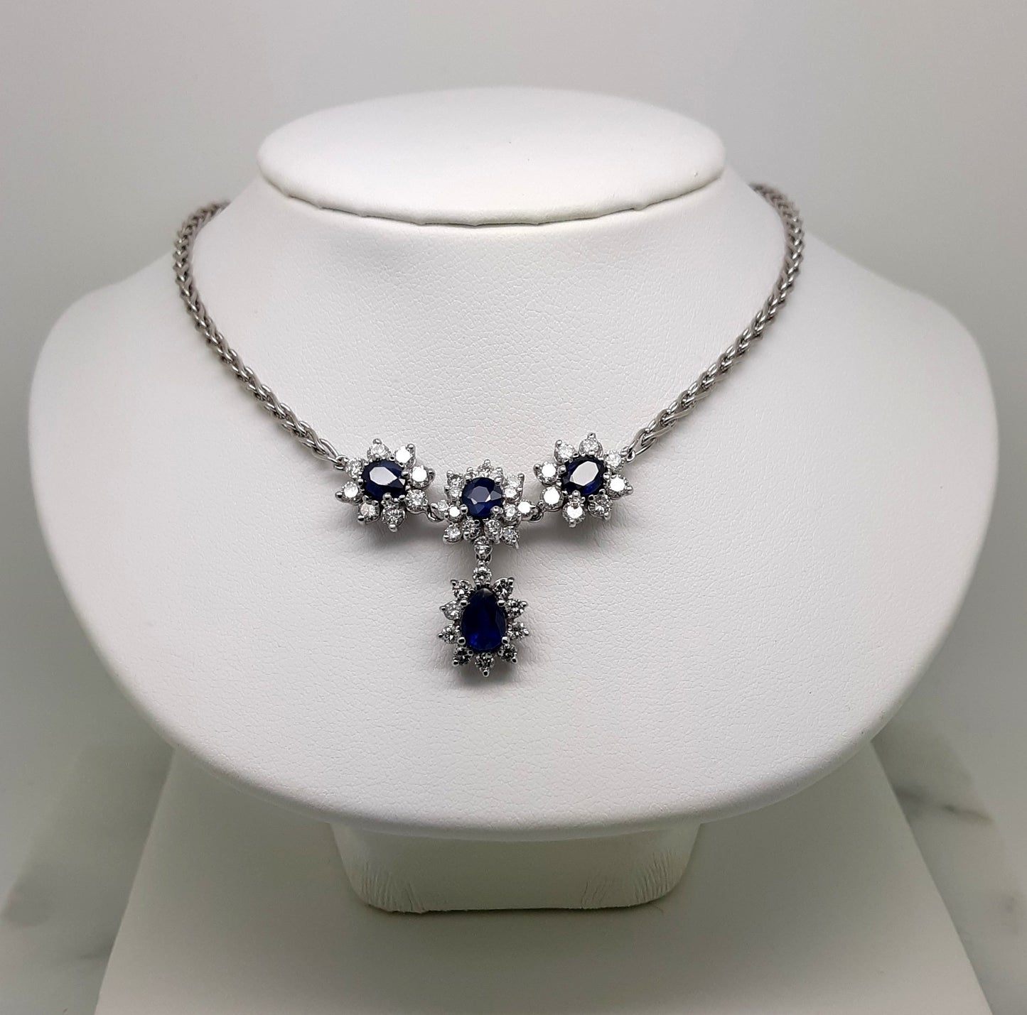 A Lady’s fine estate 14k white gold sapphire and diamond necklace.  Circa 1990s