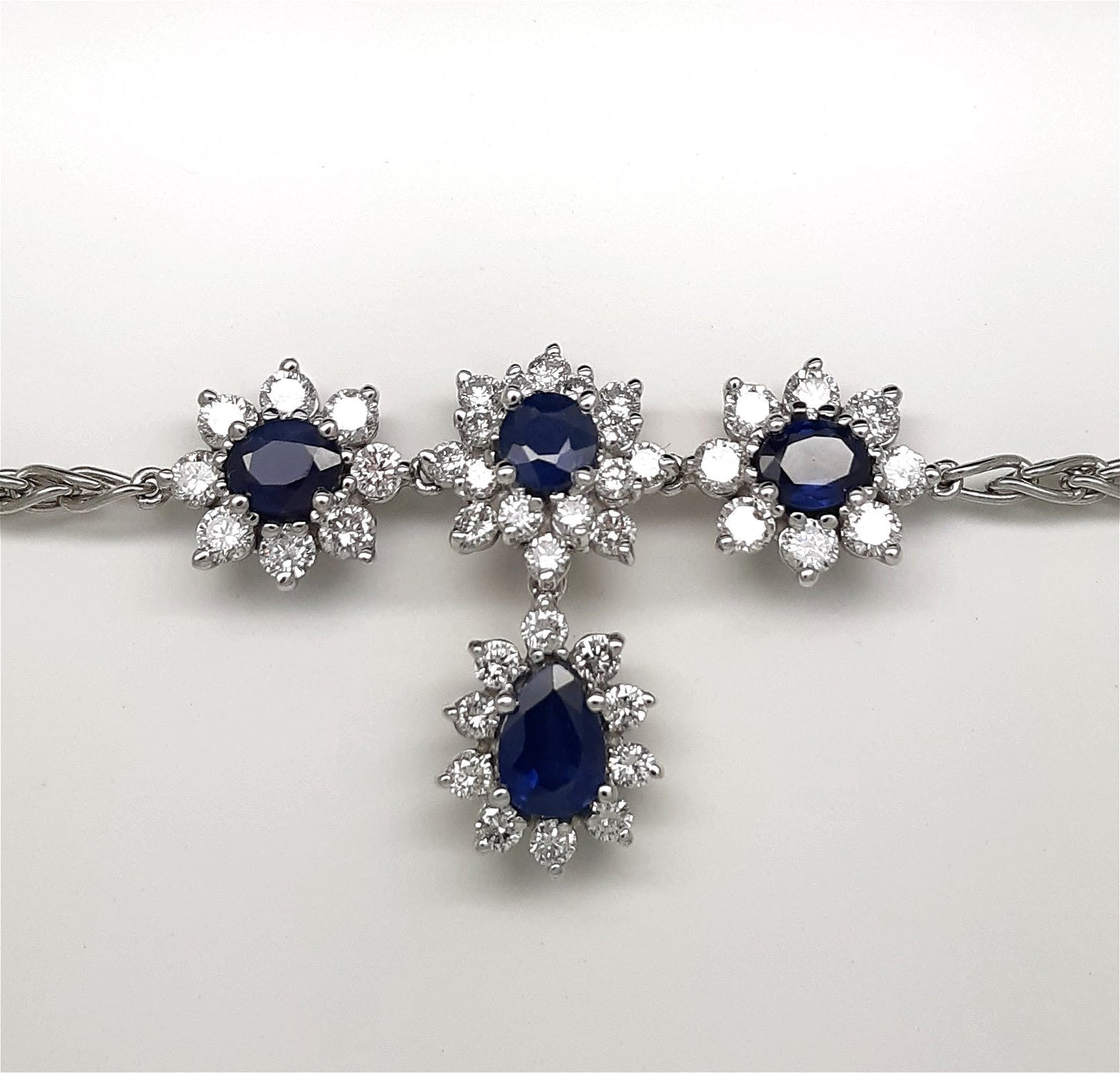 A Lady’s fine estate 14k white gold sapphire and diamond necklace.  Circa 1990s