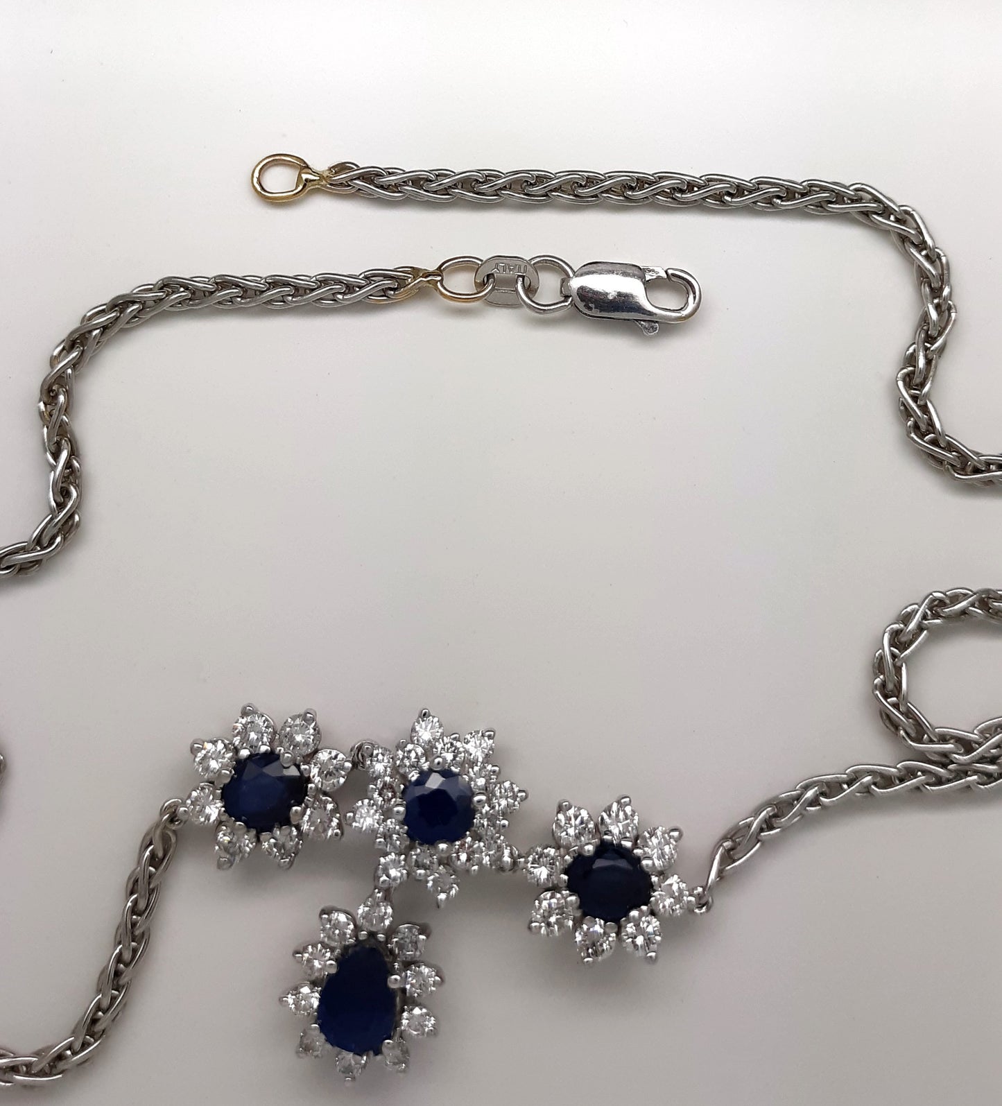 A Lady’s fine estate 14k white gold sapphire and diamond necklace.  Circa 1990s