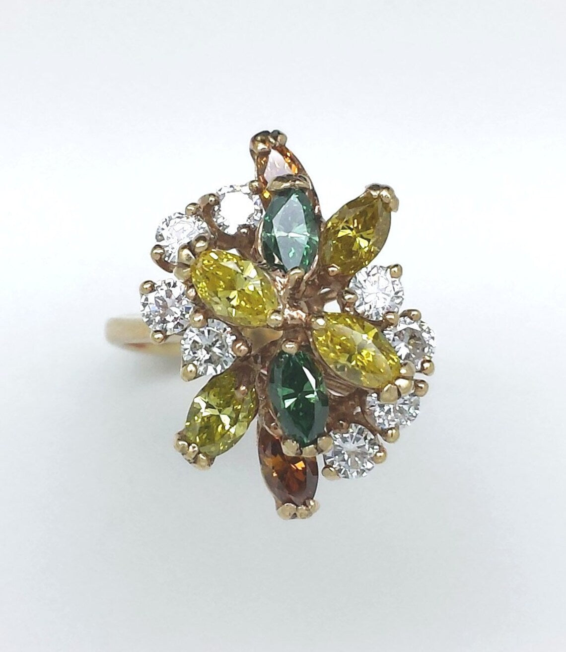 A lady's estate 14k yellow gold fruit salad fancy color diamond dinner ring. c 1970s