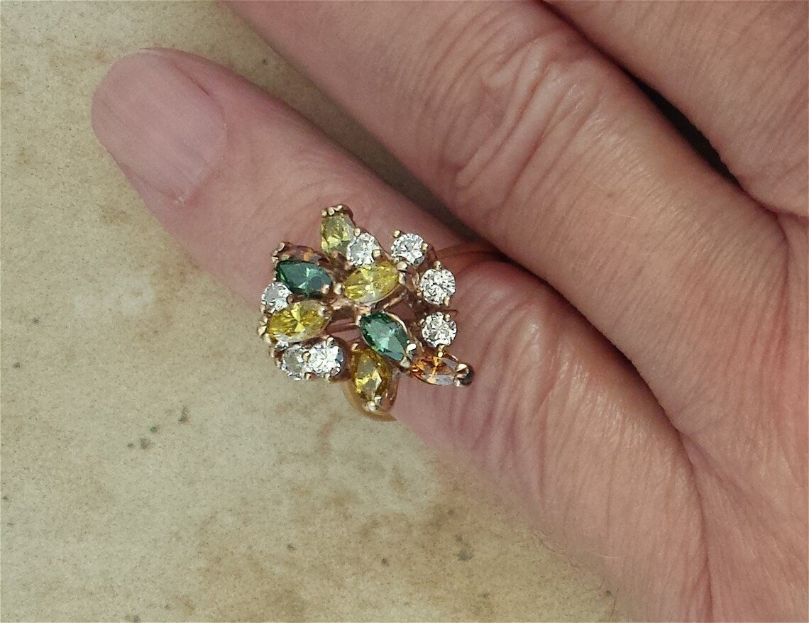 A lady's estate 14k yellow gold fruit salad fancy color diamond dinner ring. c 1970s