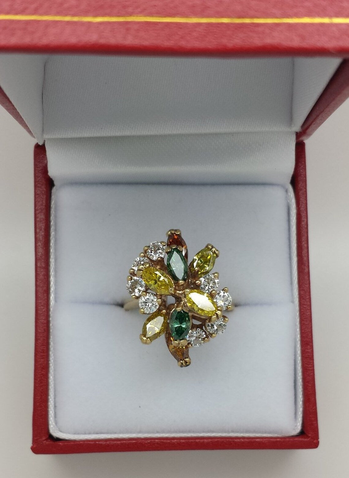 A lady's estate 14k yellow gold fruit salad fancy color diamond dinner ring. c 1970s